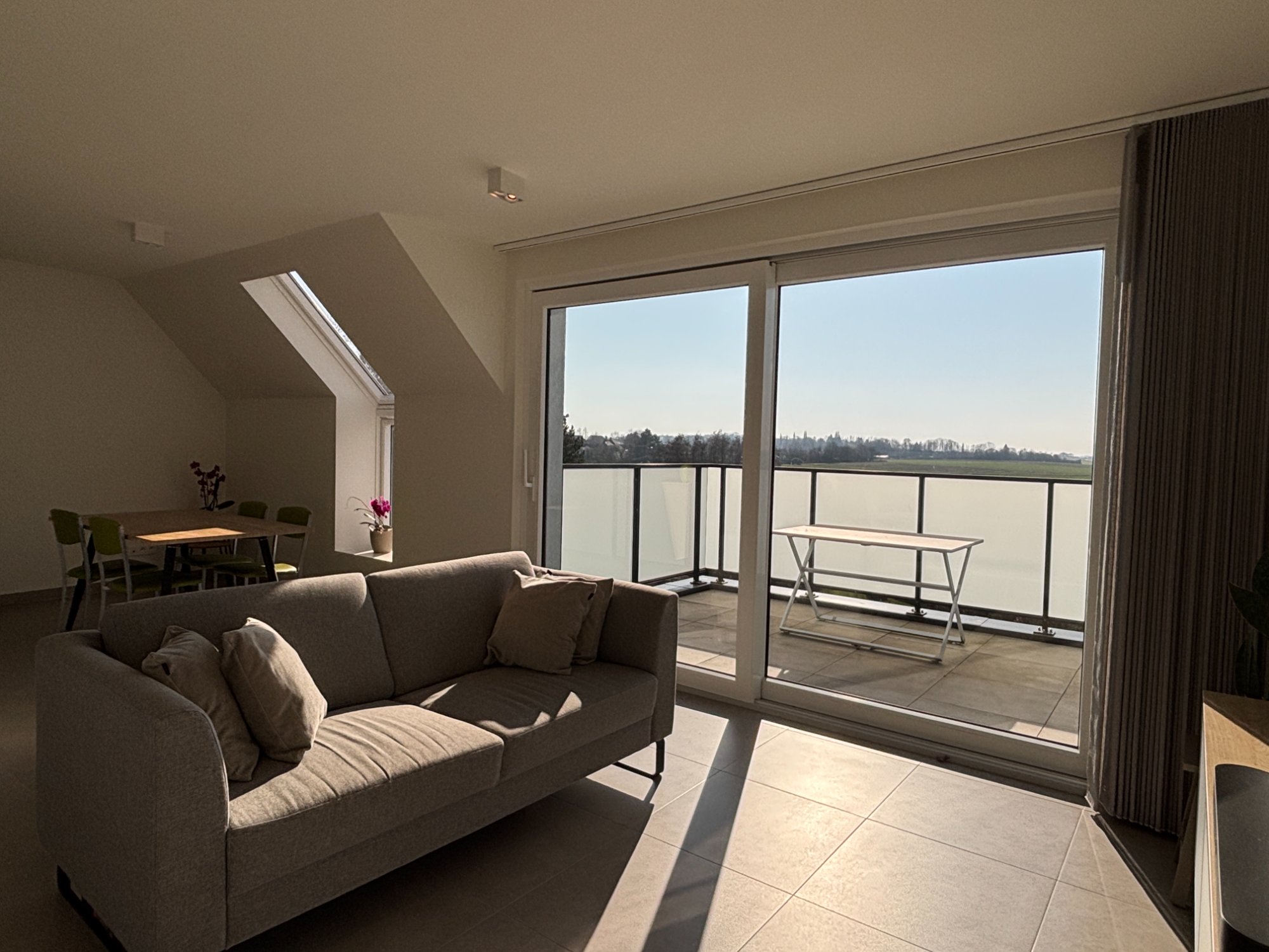 Dakraam met uitzicht Vlaamse Ardennen